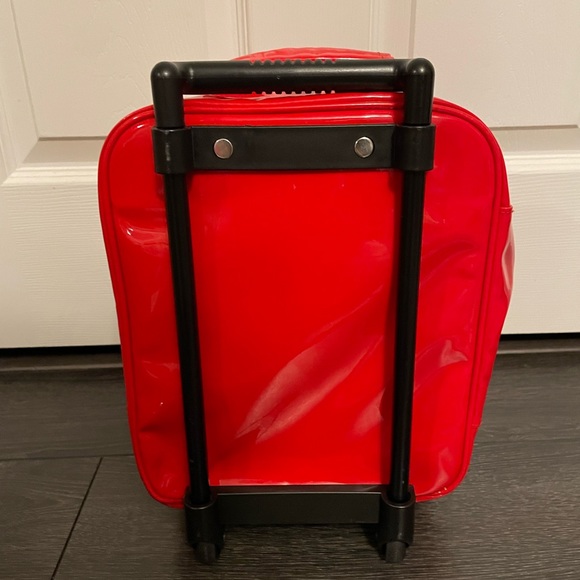 Hello Kitty 12” tall suitcase with wheels. - Picture 6 of 12